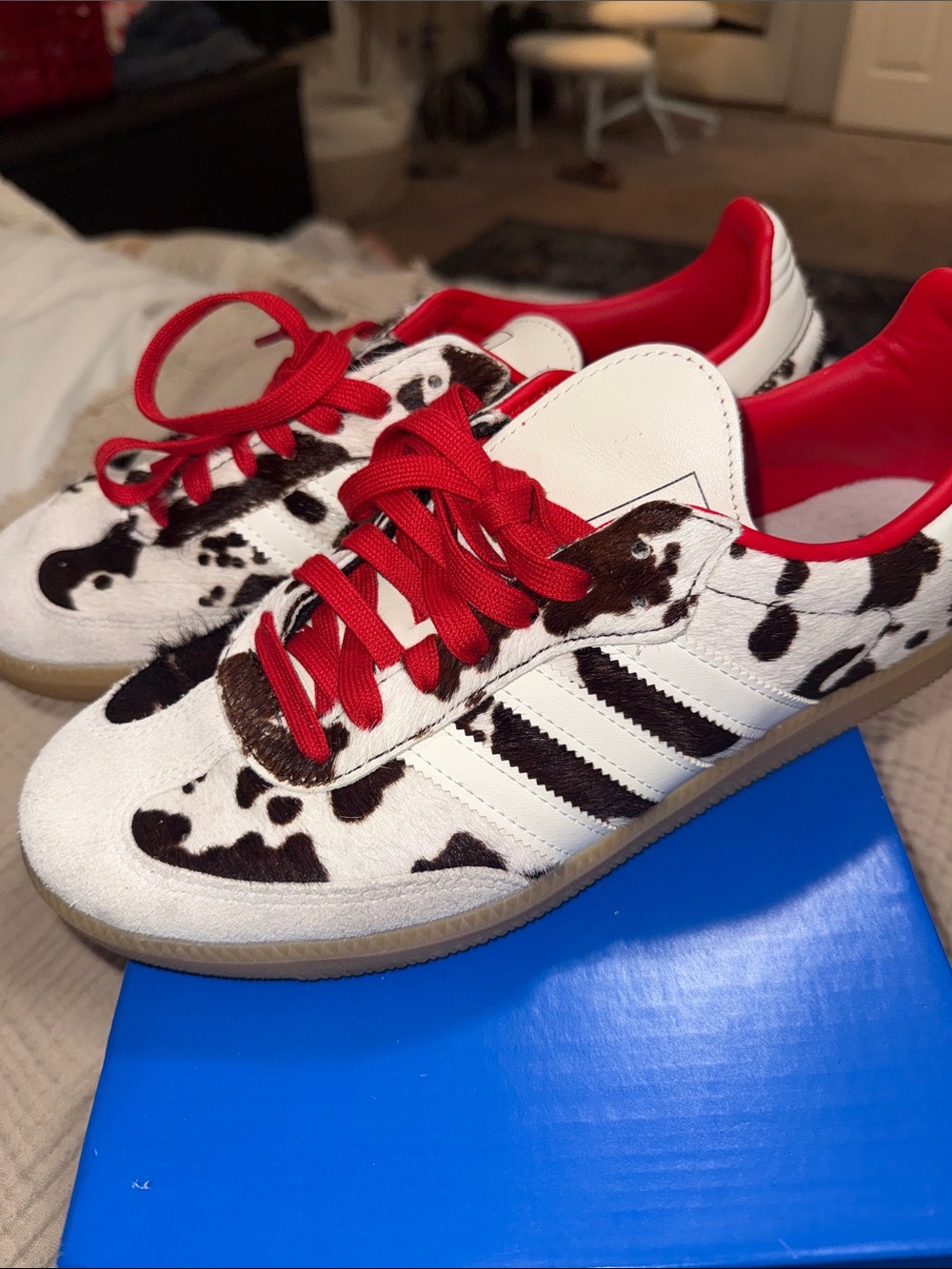 Women’s adidas Cow Print Sneakers in White and Black with Red Laces
